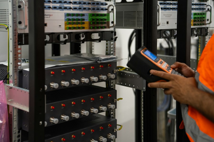 Technician checking network equipment